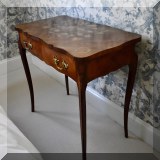 F28. Marquetry table. 29”h x 31”w x 17”d 